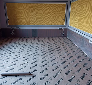 Укладка подложки под ковролин